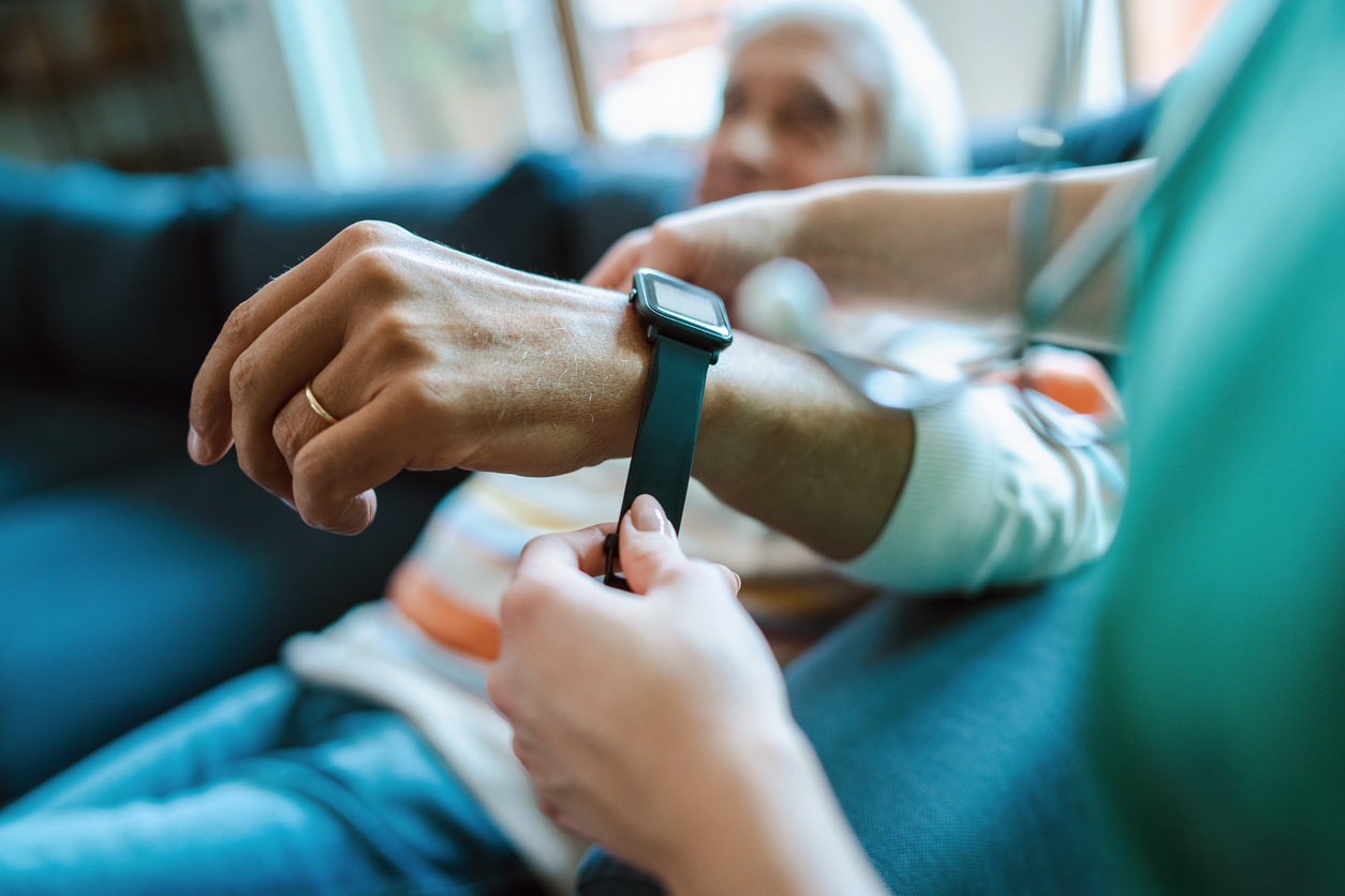 Close-up of patient wearing a medical monitor